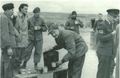 No 77 Squadron Association  Korea photo gallery - September 1950. Pohang Air Base, South Korea.  77 Squadron Personnel. Camp Site Coffee Break.  FltSgt Keith Murray, Instrument Fitter, LAC Jim Eccles, Armament, LAC ...... Radio TEch, LAC Dinny O'Brien, Airframe Fitter.  Front: Cpl Bernie Lane, Engine Fitter.  Far Right: DC3 Pilot P3 (Dinny O'Brien)